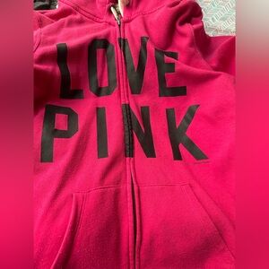 Vibrant Pink Hoodie with Bold Black Print
